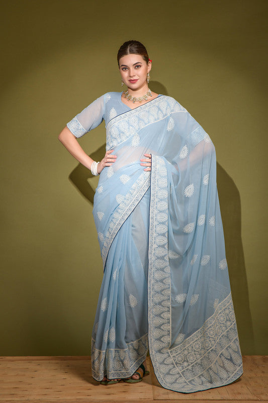 Sky blue georgette saree with delicate Lakhnavi thread work and matching blouse