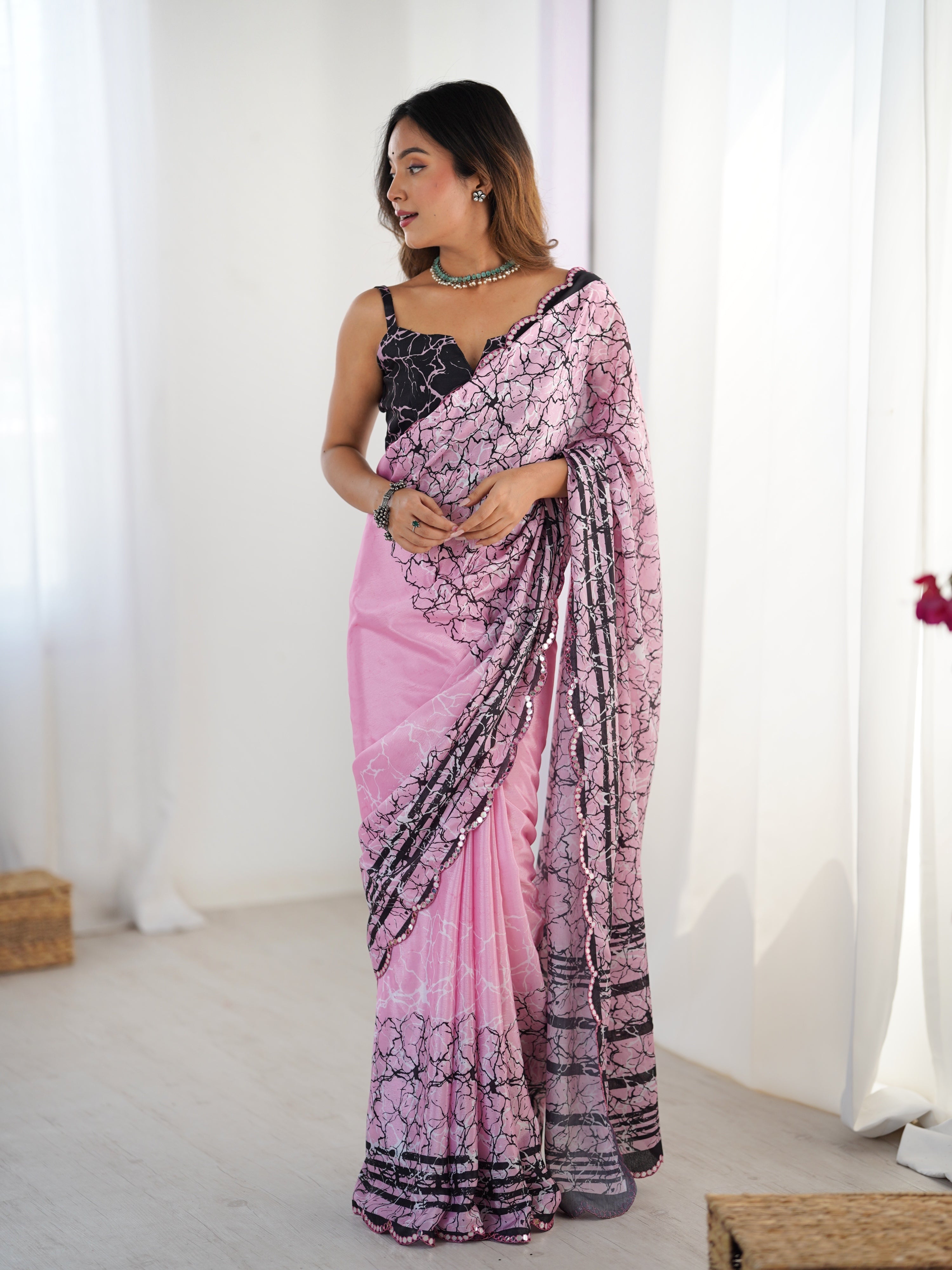 Pink Chinon digital printed saree with a delicate mirror lace border and matching blouse.