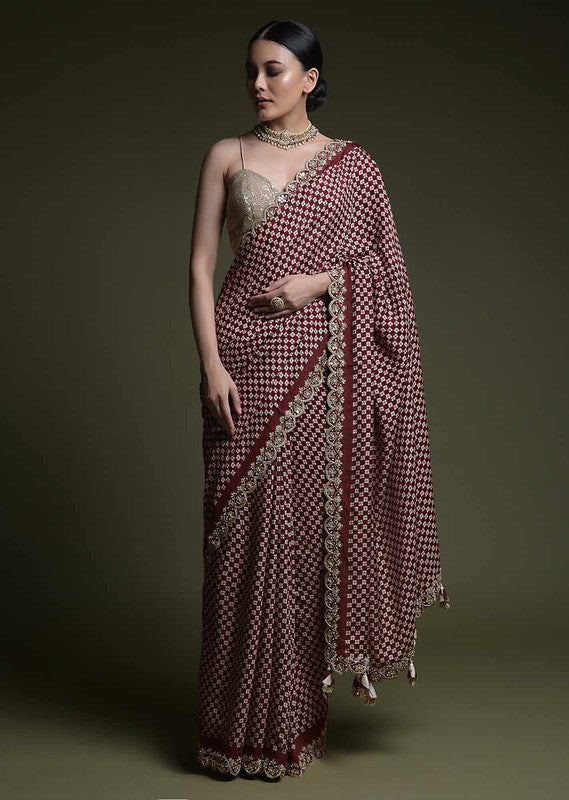 Luxurious wine chinon saree with sequence coding work and matching blouse