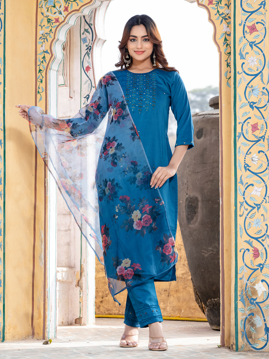 Close up of a Morpich silk kurta set with detailed handwork and matching dupatta.