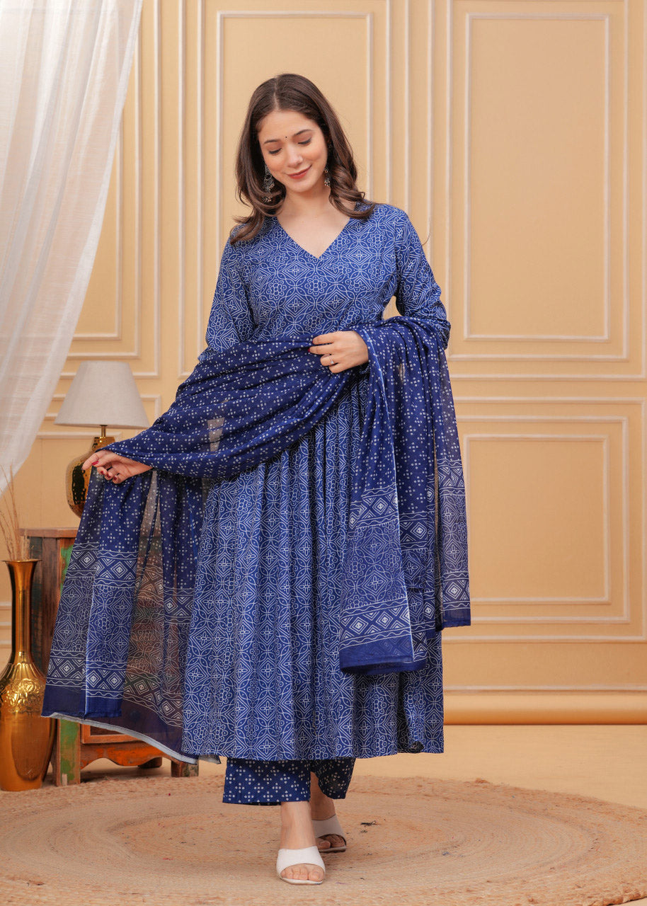 Front view of a woman wearing a blue printed rayon straight kurta set with a matching dupatta
