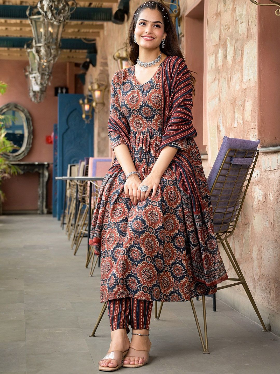 A maroon rayon printed knee-length kurta set for women with matching dupatta