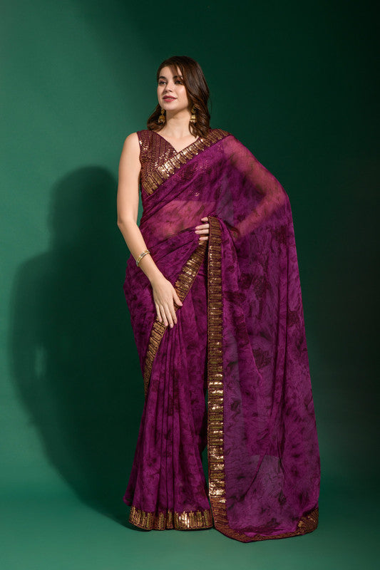 Wine-colored chiffon saree with intricate sequence embroidery and matching blouse