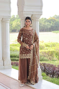 Woman wearing a Coffee Fendy designer kurta set with intricate sequins embroidery and matching dupatta