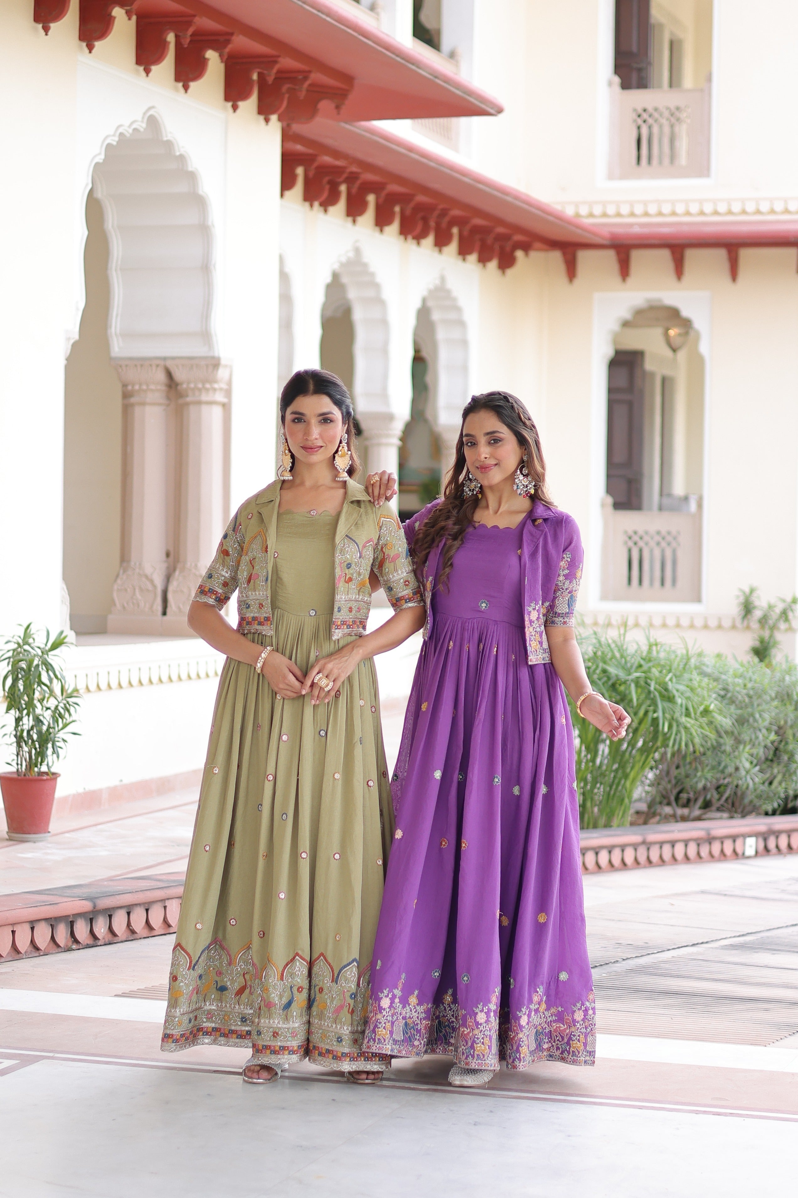 Green and purple Vichitra silk Anarkali set featuring a koti and intricate zari thread work.