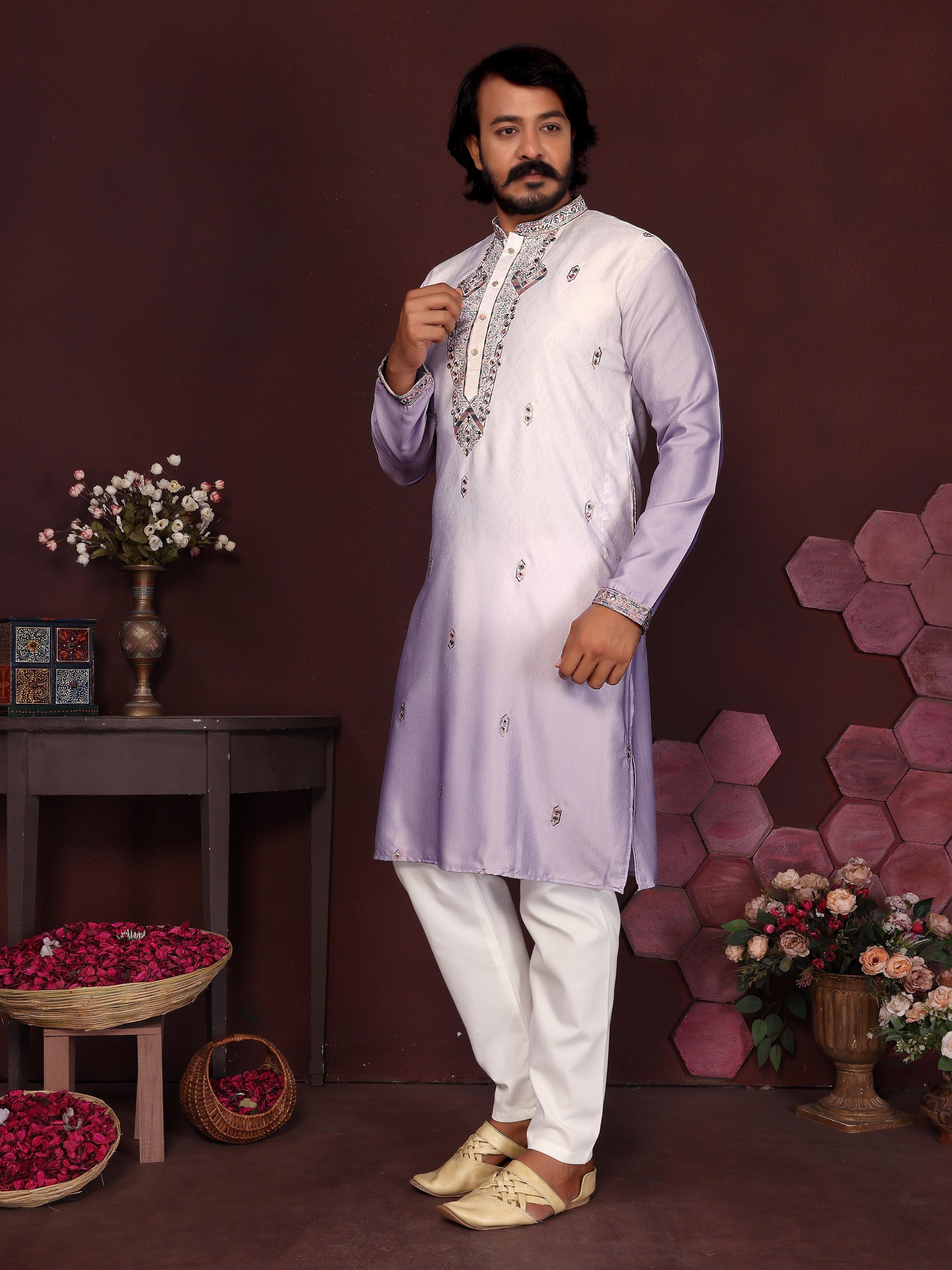 Close up of a purple boys kurta featuring detailed sequins embroidery and a round neckline