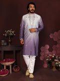 Men wearing a Jamuni color kurta with intricate sequins embroidery and matching pajamas