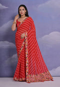 Vibrant red georgette saree featuring detailed coding sequence work and matching blouse