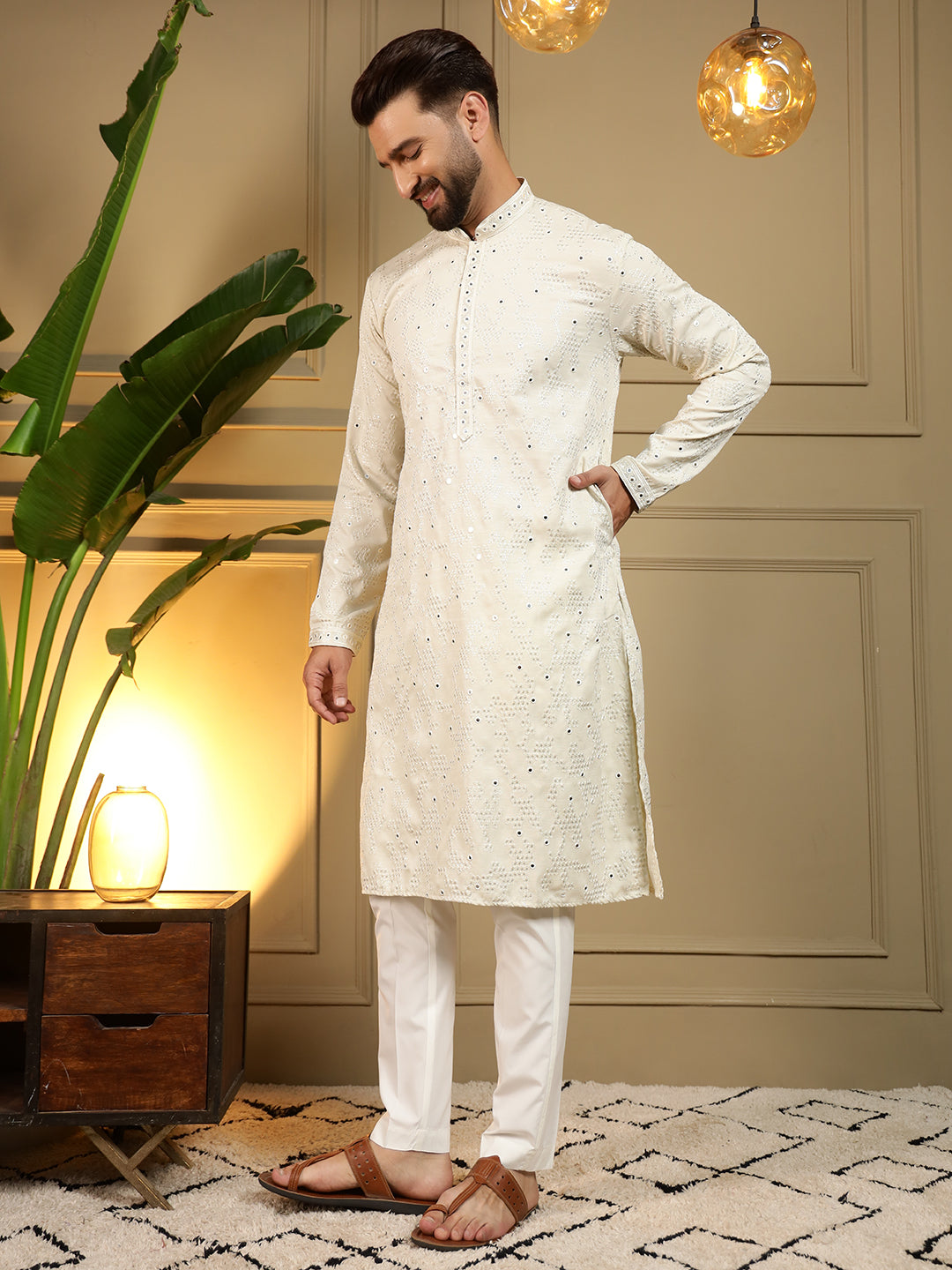 Little boy wearing an off-white Khadi cotton kurta with mirror embroidery and matching pajamas