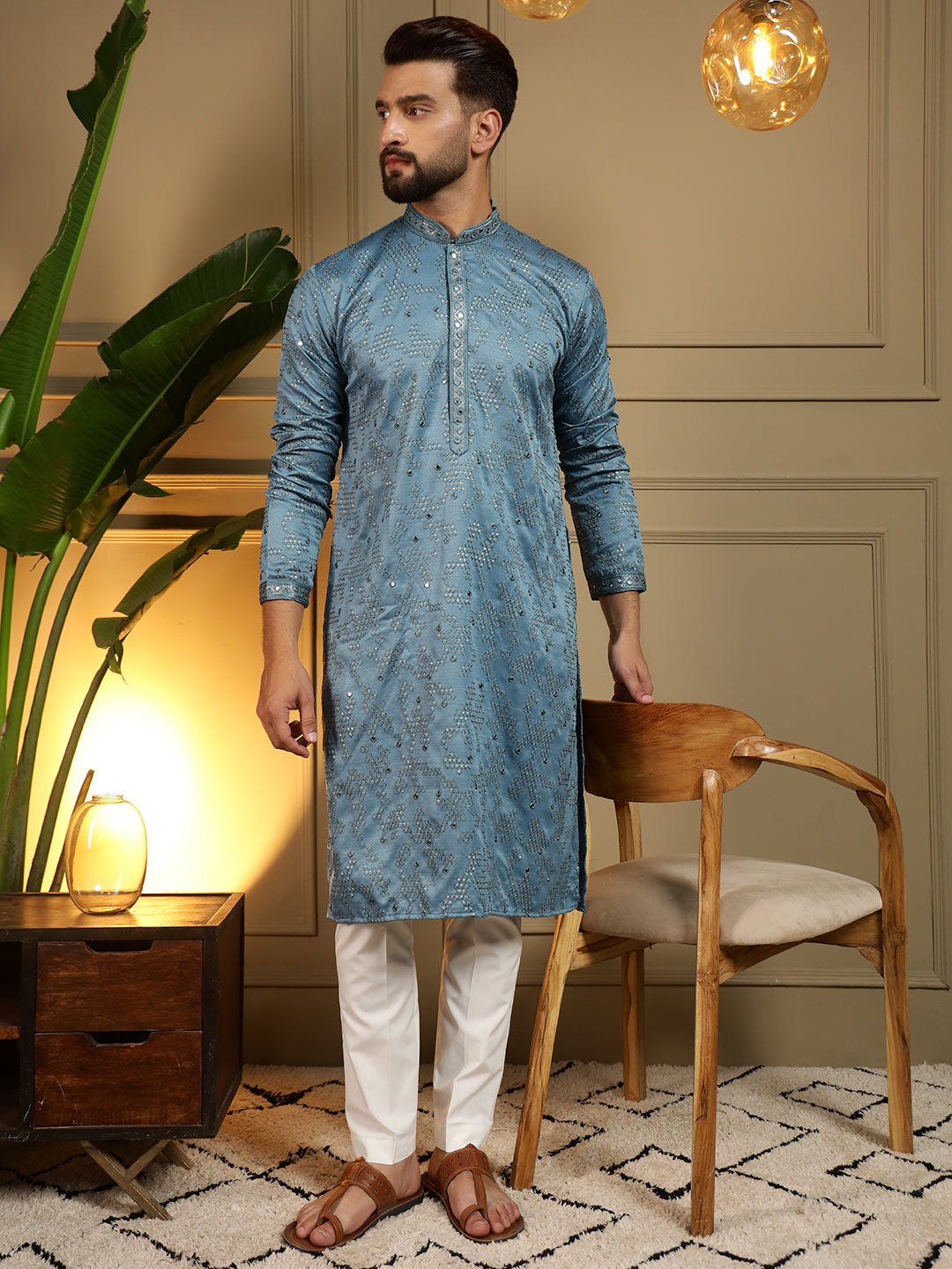 A Firozi colored toddler boys kurta featuring mirror embroidery and matching pajamas in Khadi Cotton.