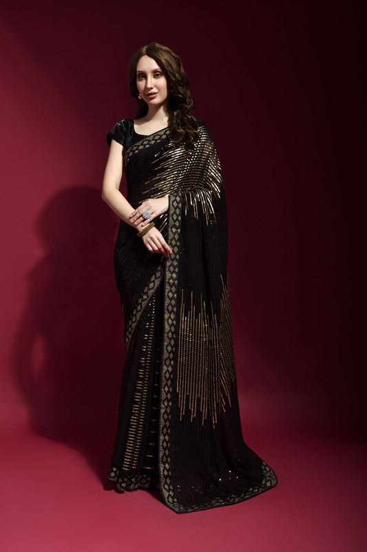 Black georgette saree with sequin embroidery detailing and matching blouse