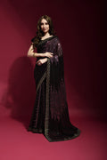 Elegant wine georgette saree featuring intricate sequin embroidery with matching blouse