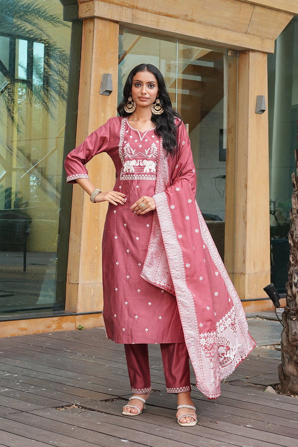 Peach Vatican embroidered kurta set including a matching dupatta and cotton lining.
