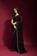 Wine-colored georgette saree adorned with delicate sequence embroidery
