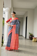 Navy blue soft Tussar silk saree with Ikkat prints and matching blouse