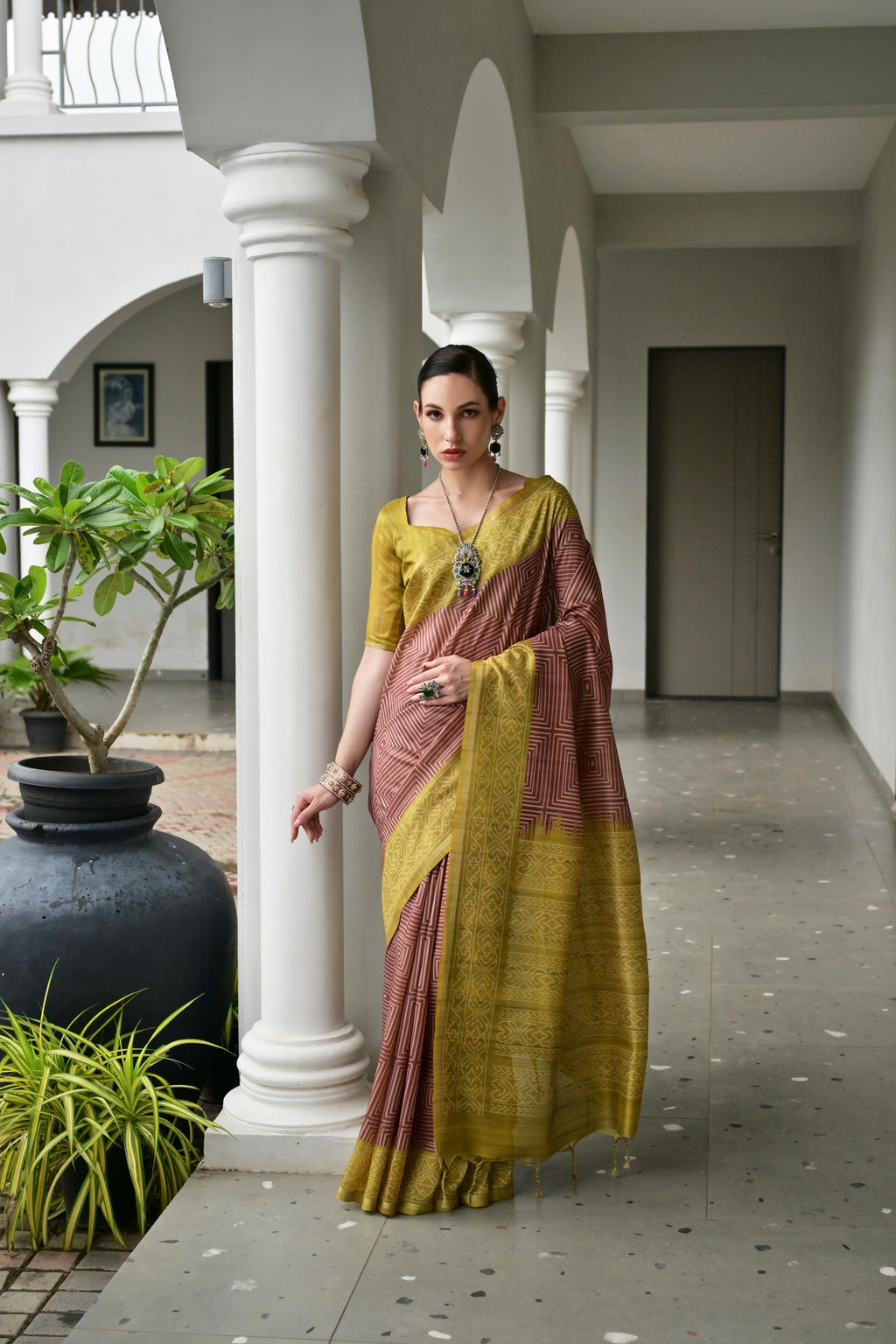 Maroon Tussar silk saree with traditional Ikkat print and matching blouse