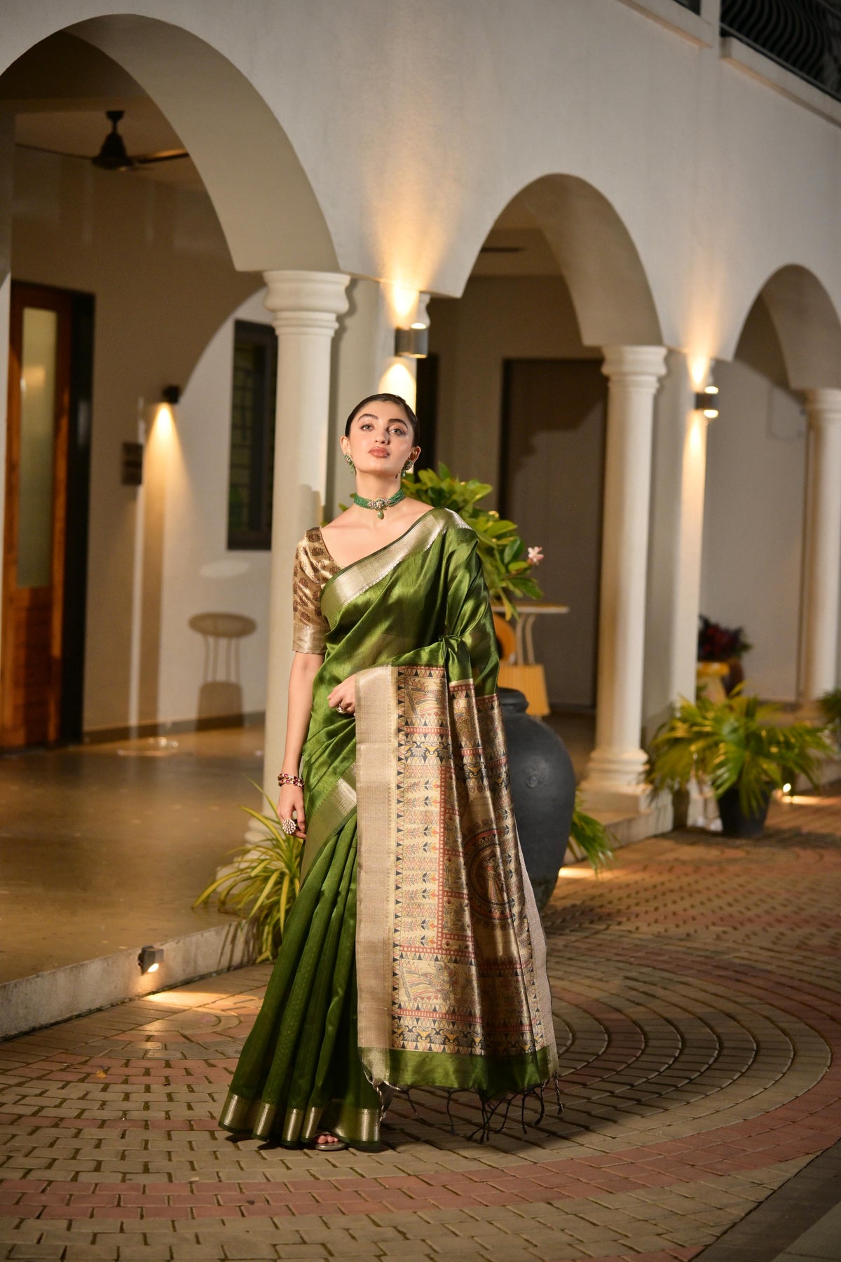Green soft Khadi raw silk saree with zari woven motifs and matching blouse