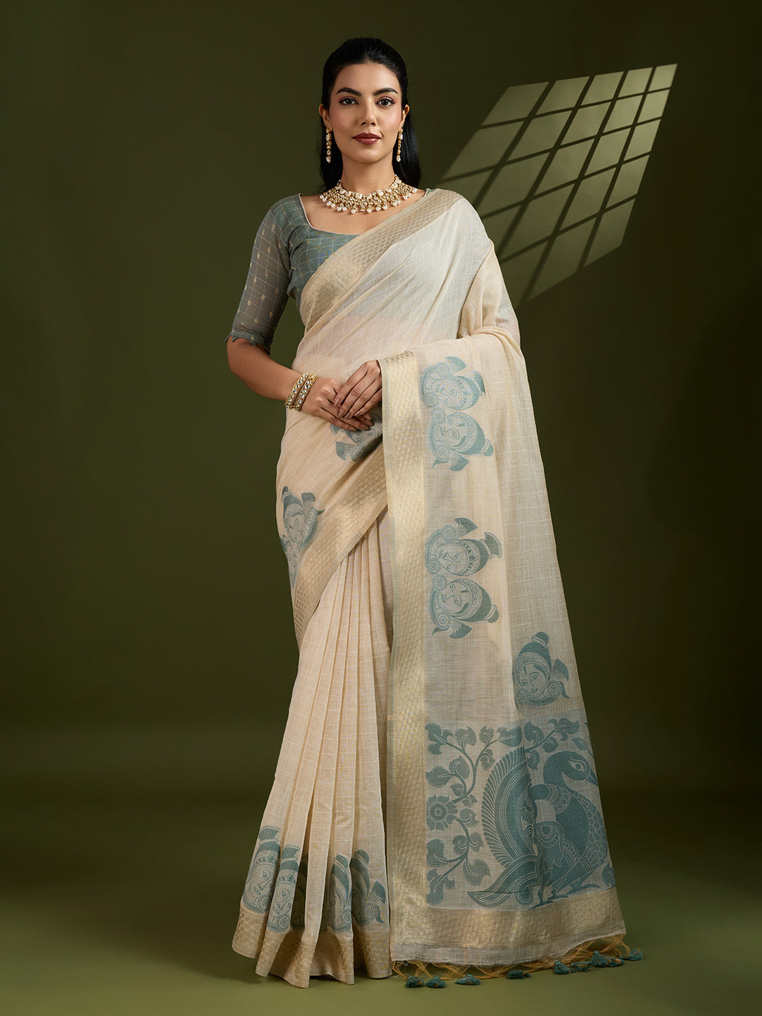 Grey soft Muga cotton saree featuring intricate Kalamkari woven patterns
