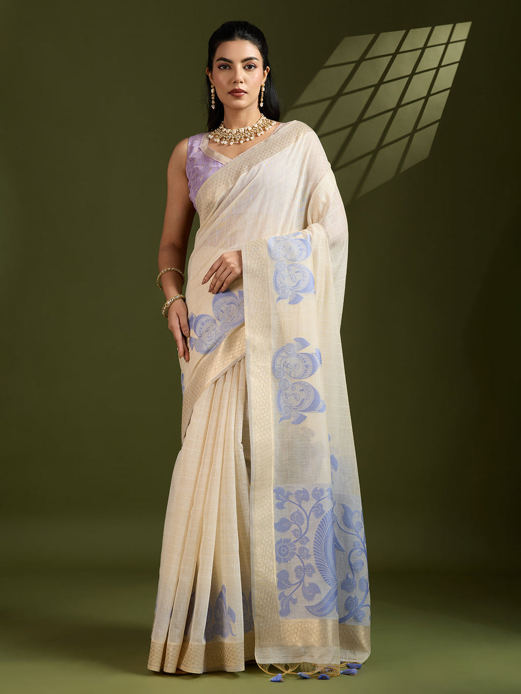 Purple soft Muga cotton saree with traditional Kalamkari woven patterns.