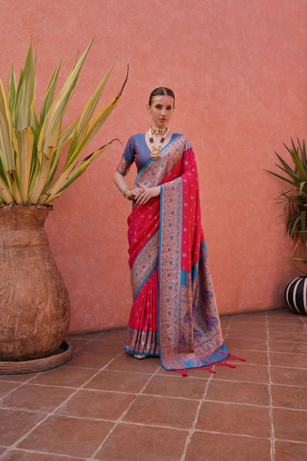 Rani Pink Paithani silk saree with detailed Zari weaving patterns