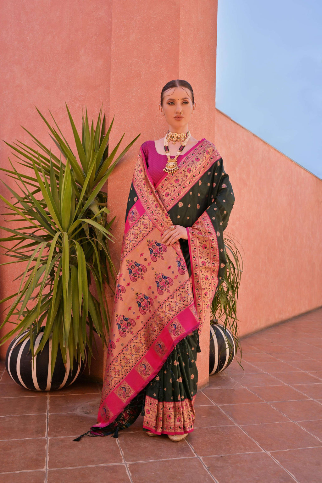 Bottle green Paithani silk saree with golden zari woven border and matching blouse