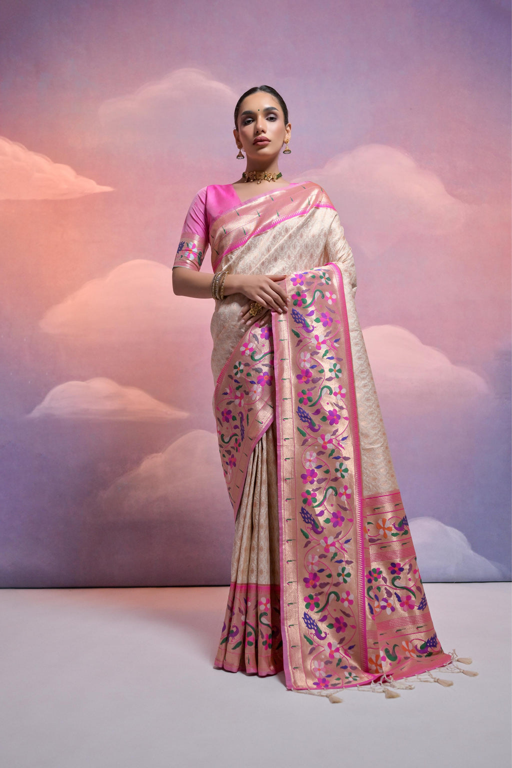 Off White Paithani Silk saree with an elegant Zari woven border.