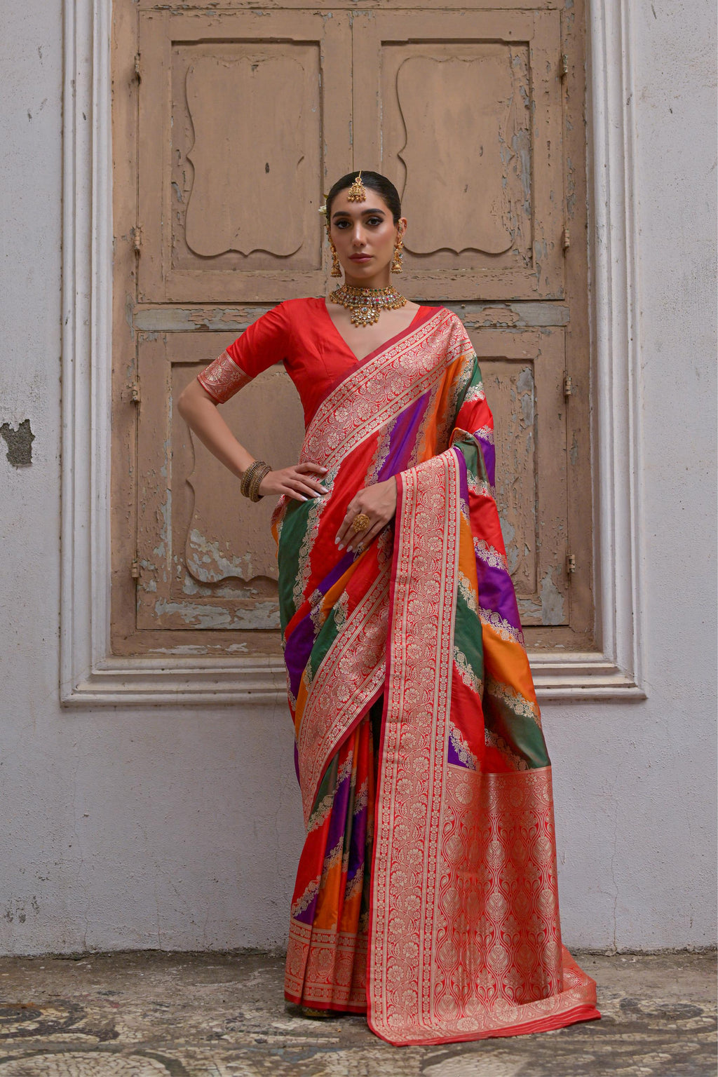 Multicolor Banarasi silk saree with traditional Kadwa Zari woven patterns.