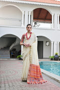 Off White Khadi Raw Silk Saree with traditional Meena woven Patola patterns.