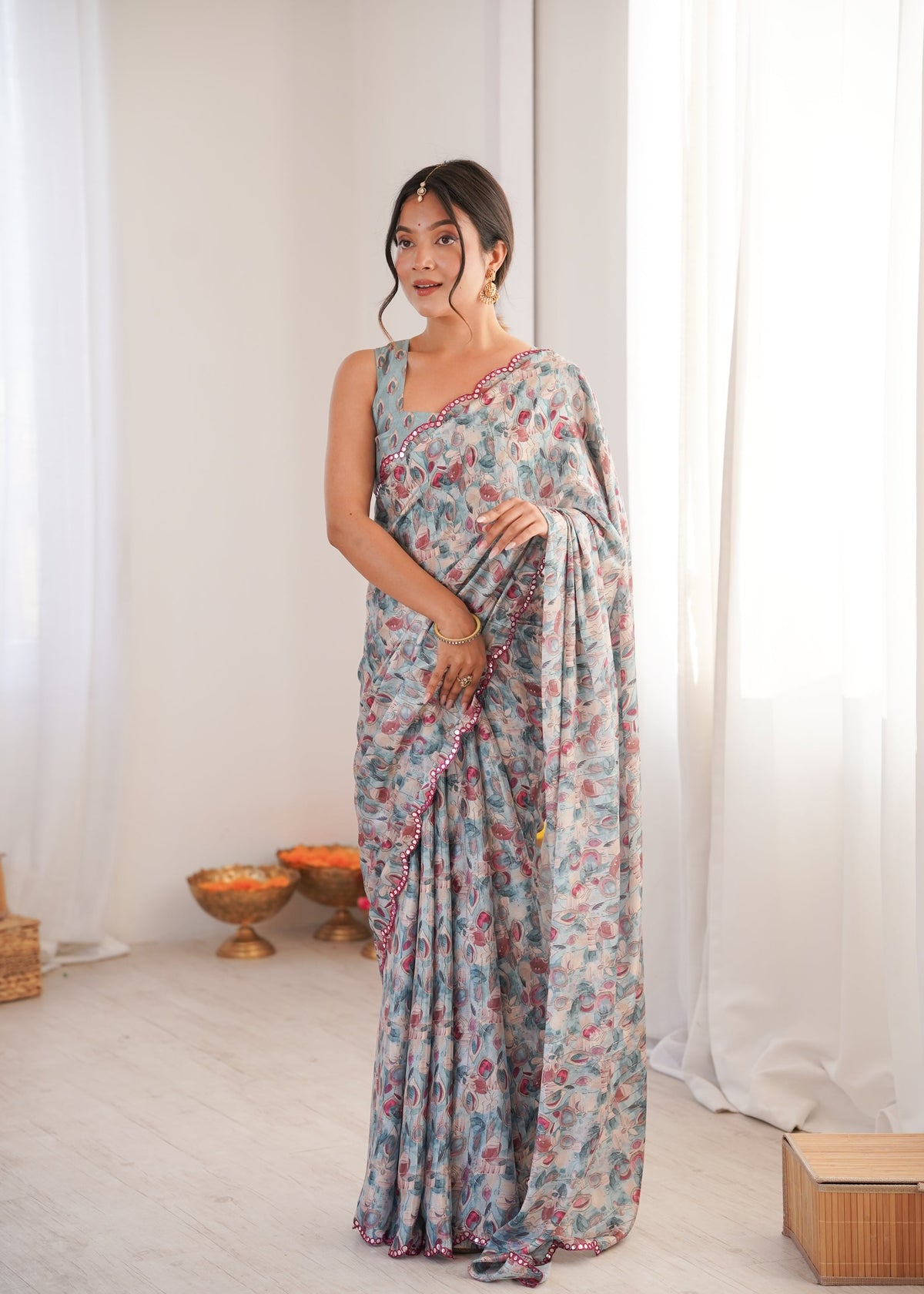Grey Chinon saree with digital prints and an elegant mirror lace border.