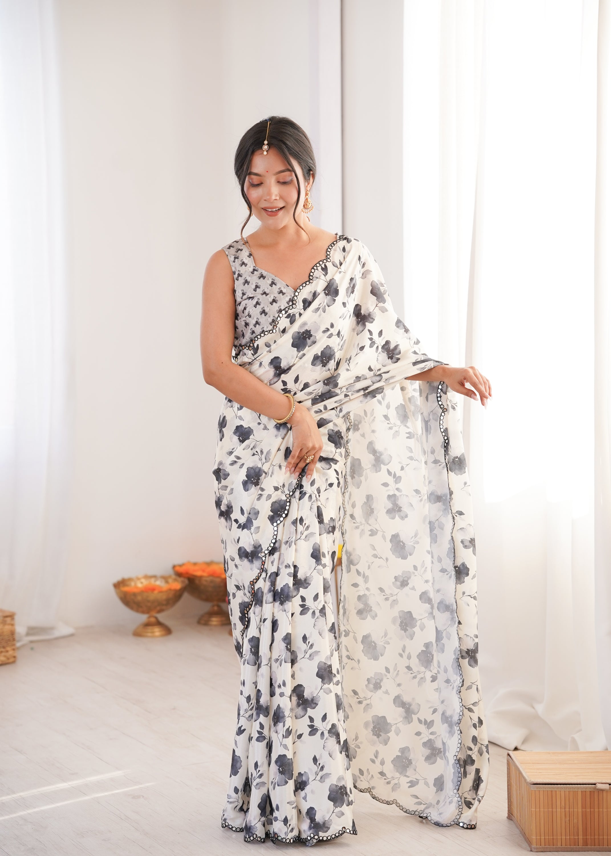 Sophisticated Off White Chinon saree featuring digital print and delicate mirror lace border