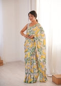 Women wearing a vibrant multicolor Chinon digital printed designer saree with detailed mirror lace border.
