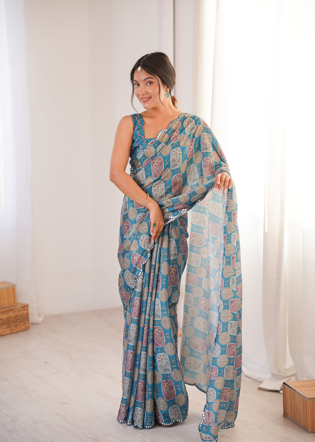 Elegant teal Chinon saree with digital prints and mirror lace border