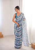 Multicolor Chinon digital printed saree with detailed mirror lace border draped elegantly