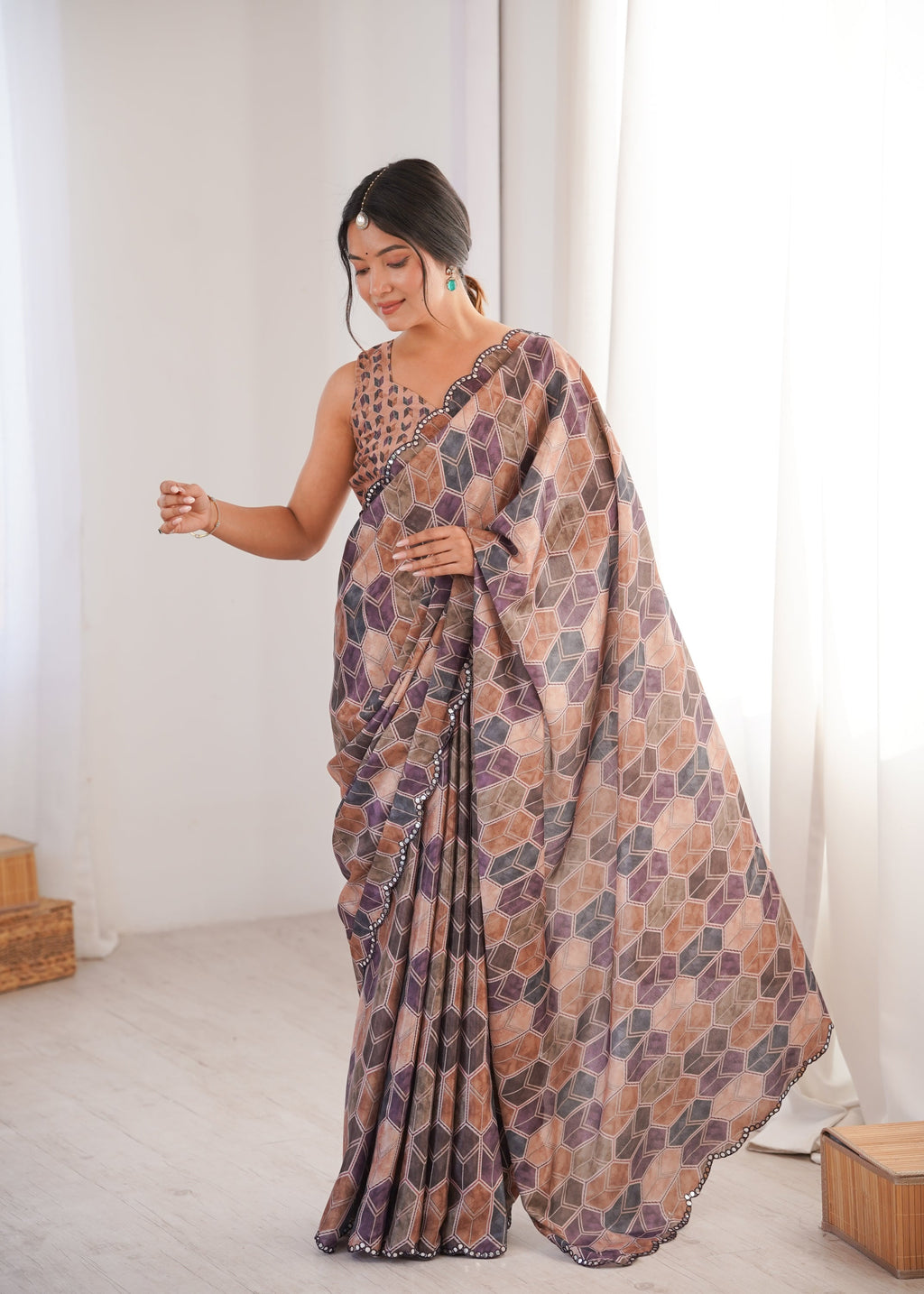 Women wearing a vibrant multicolor Chinon digital printed designer saree with detailed mirror lace border.