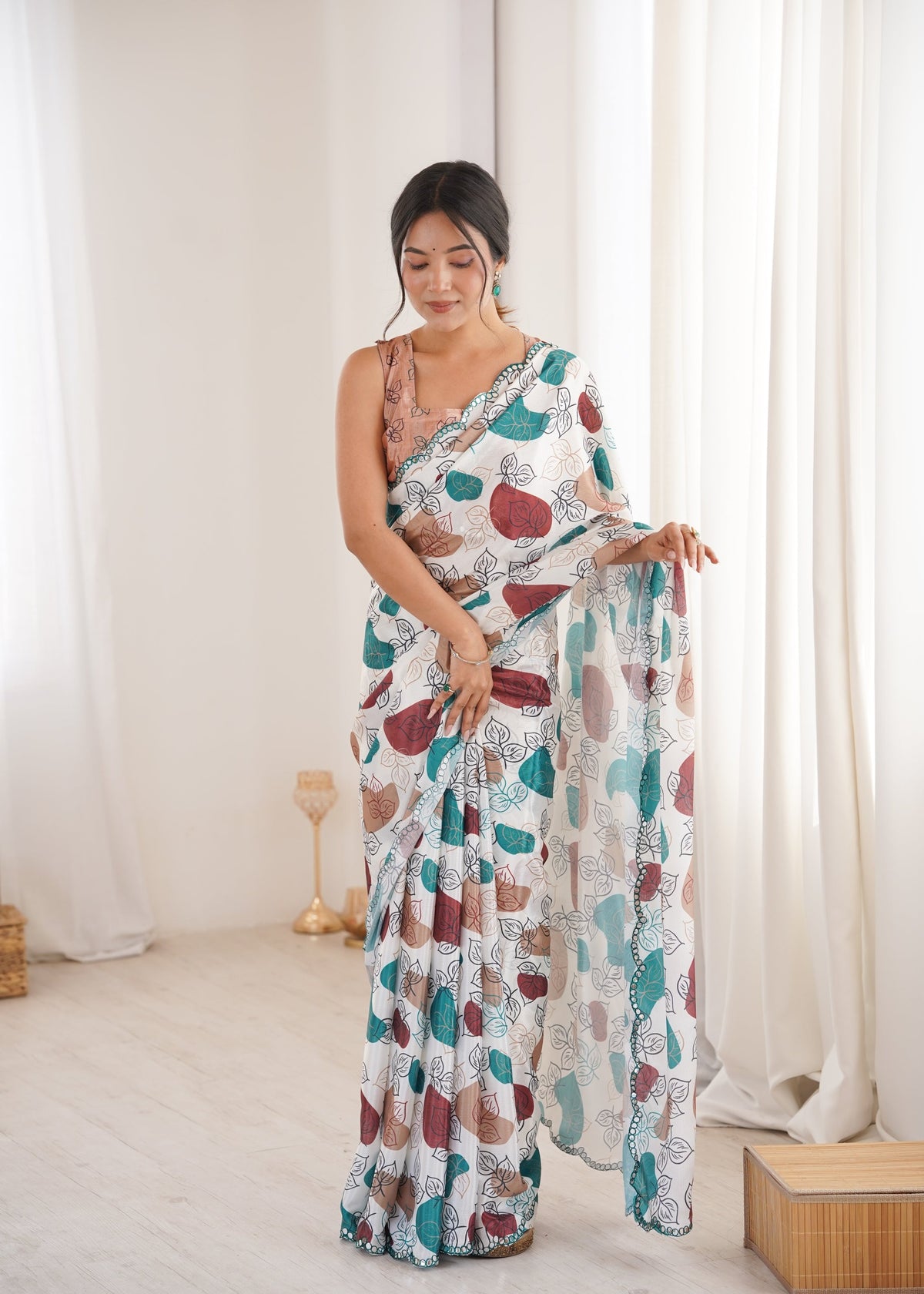 Vibrant multicolor digital print Chinon saree with mirror lace detailing.