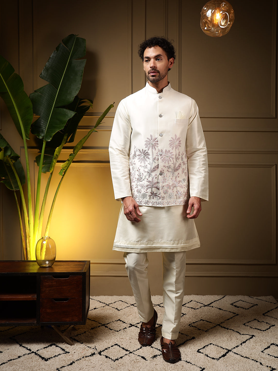 Front view of a men's pink slub silk kurta set with matching embroidered koti