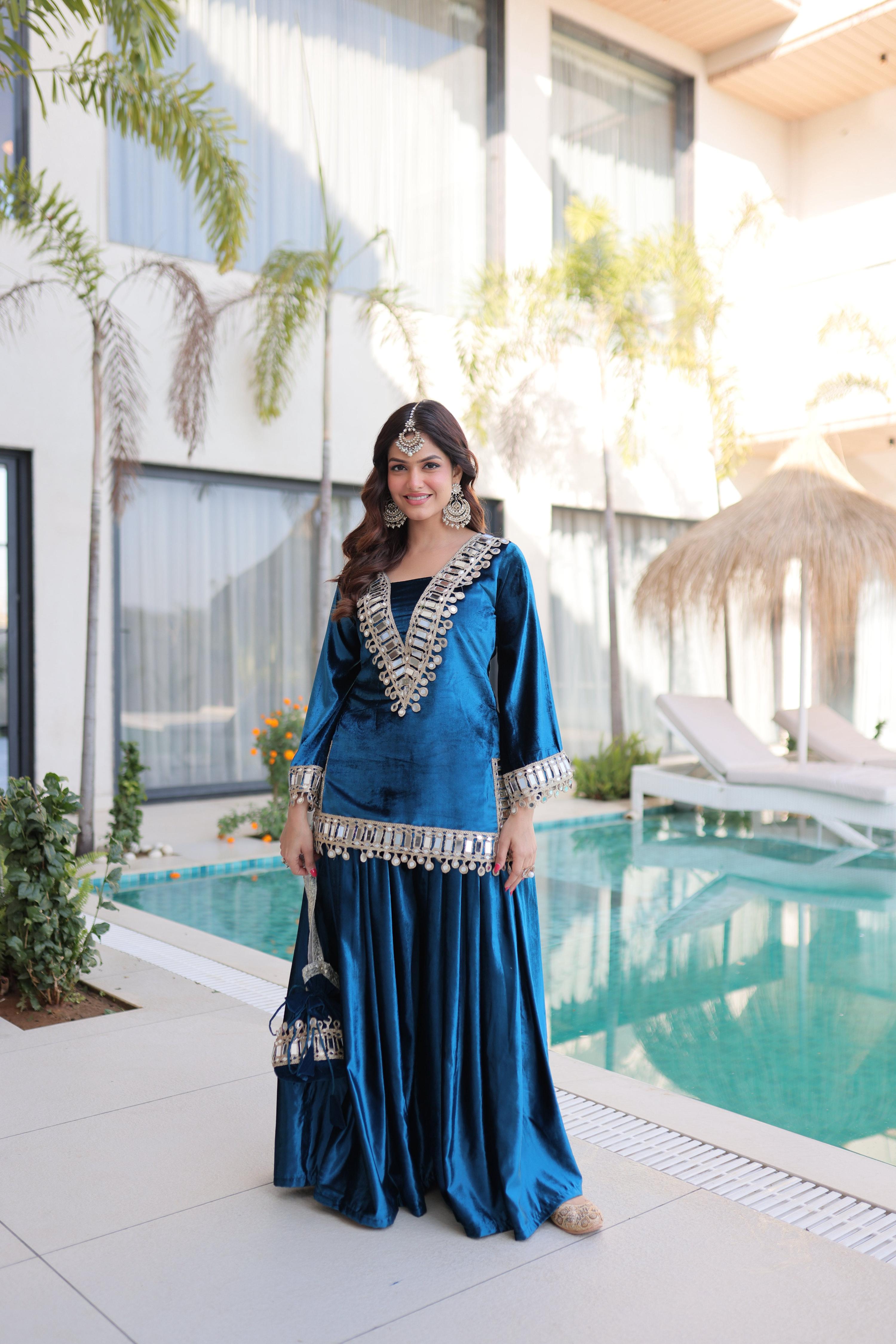 Rama ICE Velvet designer kurta set with zari embroidery, mirror work, and matching Batwa bag