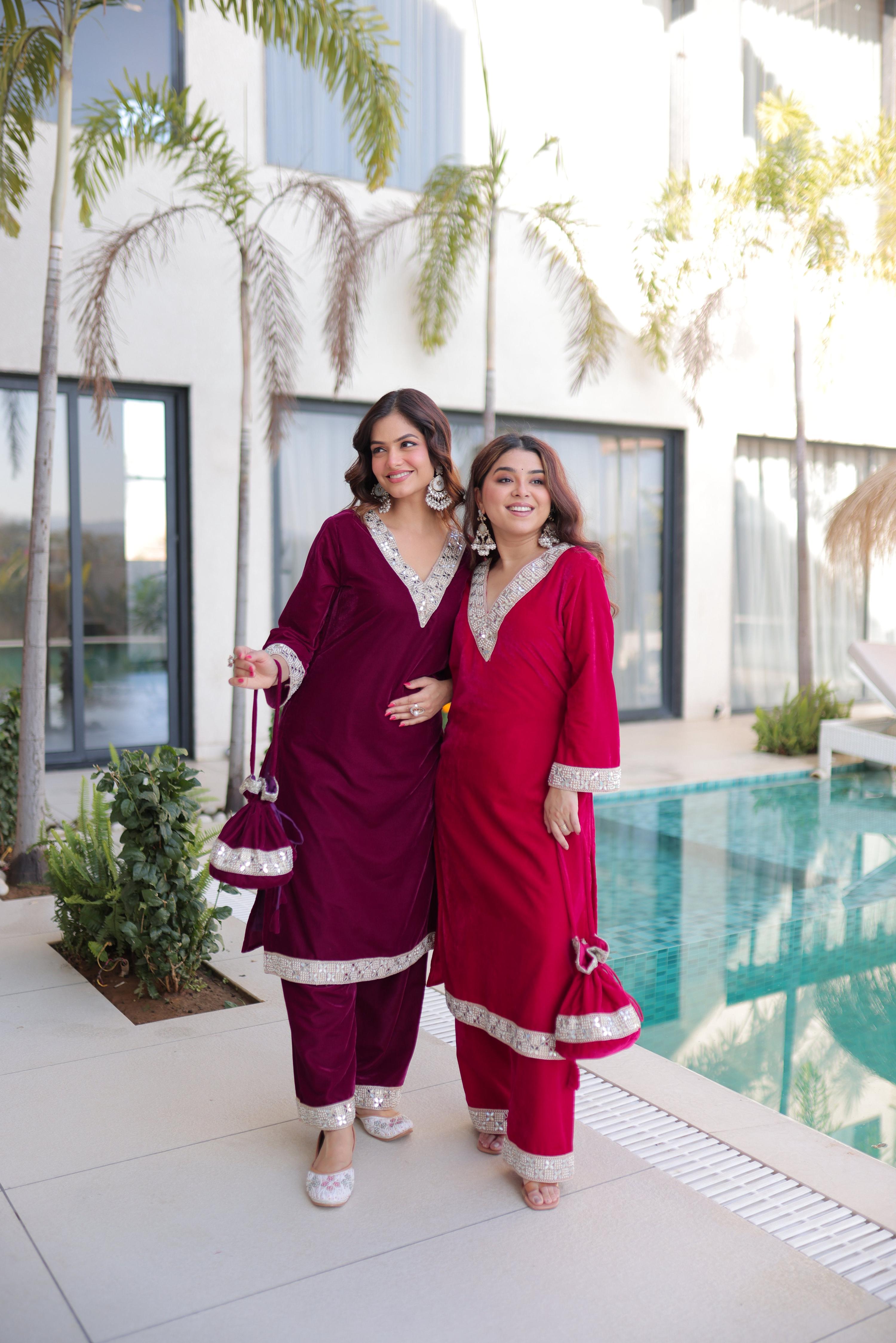 Wine and Pink velvet designer kurta set with Zari embroidery, mirror work, and a matching Batwa bag.