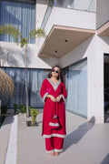 Pink velvet designer kurta set featuring real mirror work and Zari embroidery with matching bag