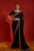 Black georgette saree with detailed coding sequence embroidery and a matching blouse.