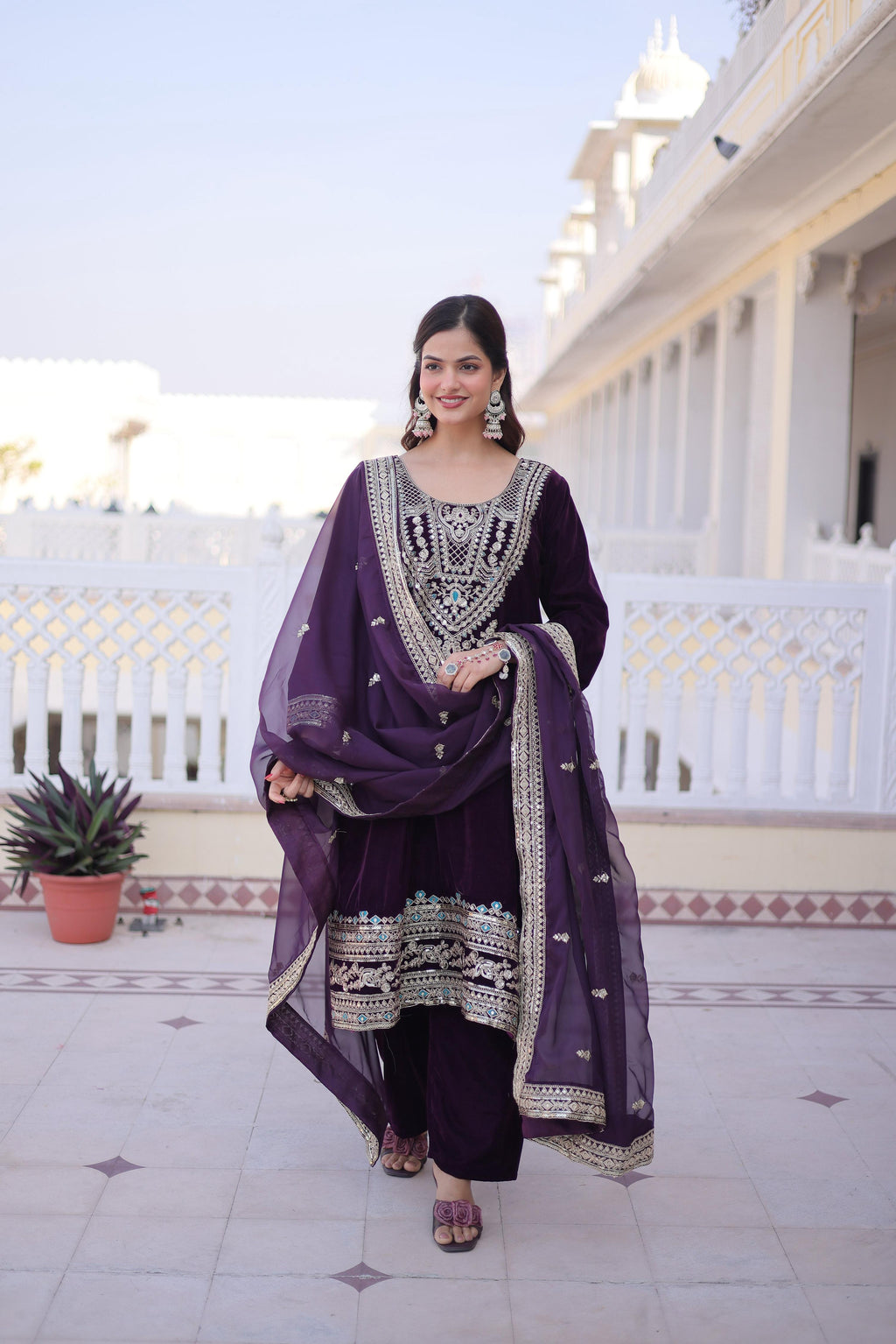 Wine colored velvet designer kurta set with embroidery and matching batwa accessory