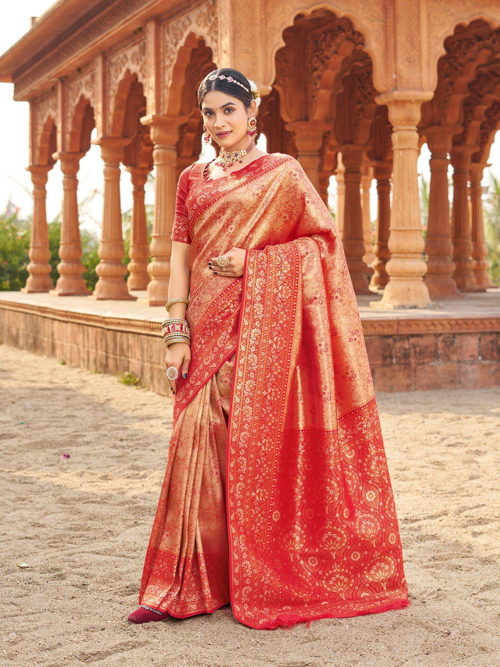 Peach colored soft Banarasi silk saree with zari weave detail