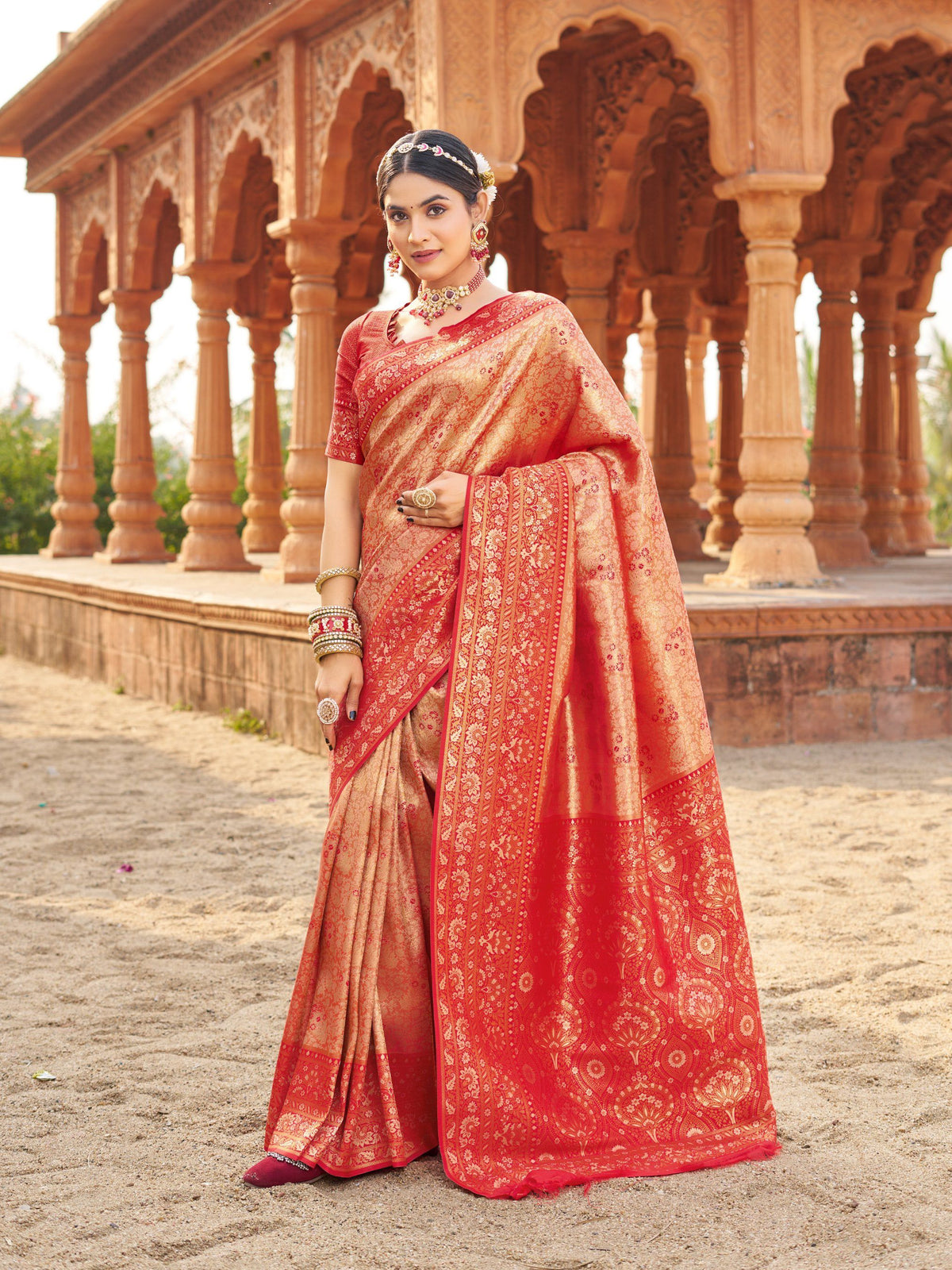 Peach colored soft Banarasi silk saree with zari weave detail