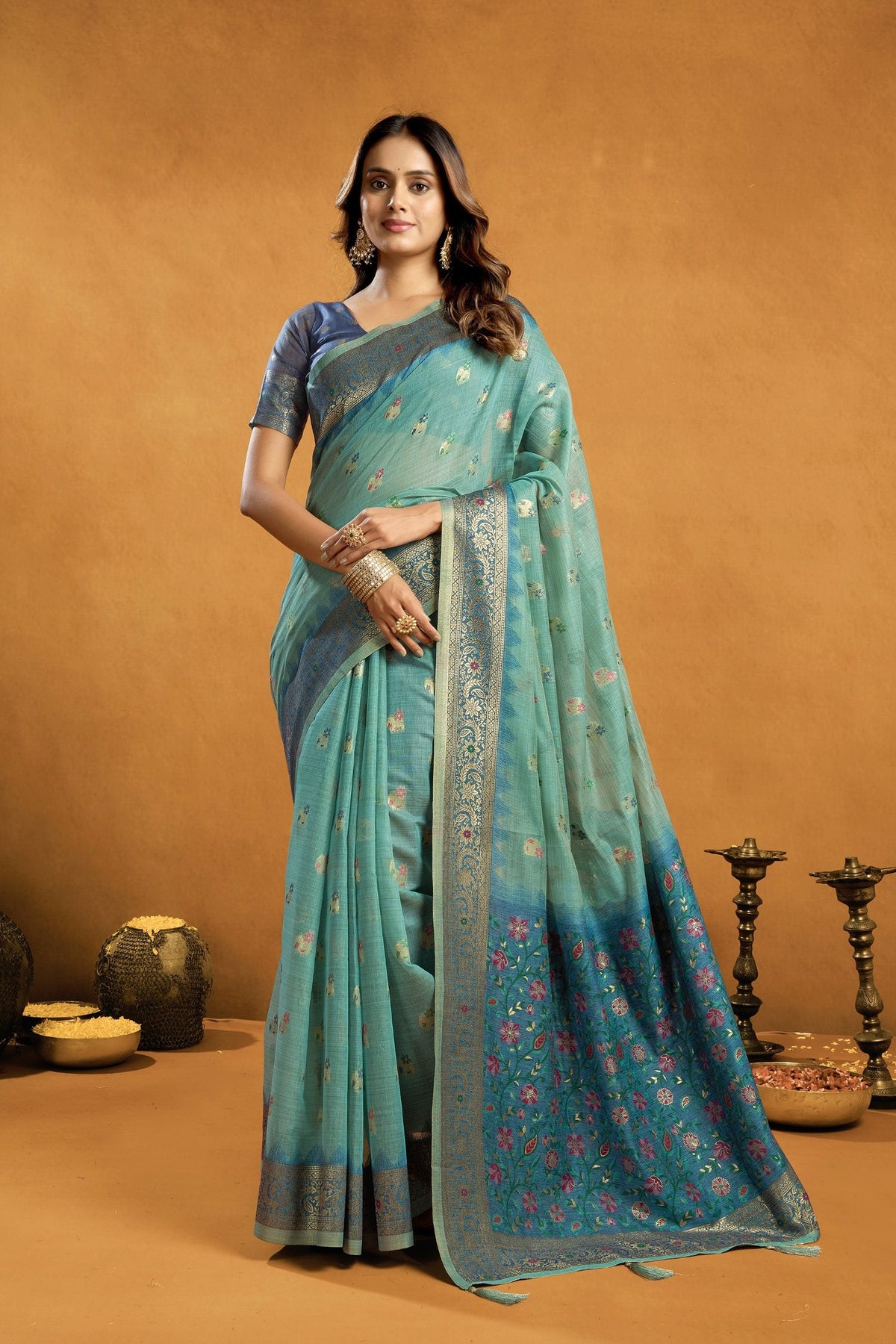 Turquoise spun cotton saree with Zari woven Jhalar border