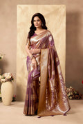 Deep wine silk saree with elaborate gold zari weaving and jhalar