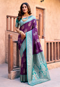 Elegant purple silk saree with zari weaving and jhalar details