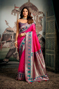 Pink soft silk saree with Zari woven detail and matching blouse piece.