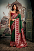 Bottle Green soft silk saree with zari woven borders and matching unstitched blouse piece