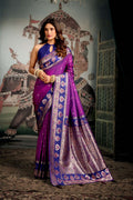 Purple soft silk saree with intricate gold Zari woven patterns and Jhallar border
