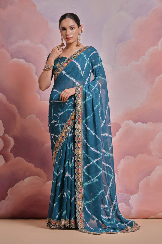 Teal georgette saree with multi-color coding sequence embroidery and matching blouse